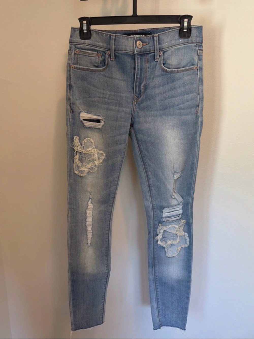 Express Light Blue Distressed Skinny Jeans